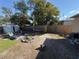 A spacious backyard featuring a fire pit, a hammock, and a storage shed for outdoor enjoyment at 5151 22Nd N Ave, St Petersburg, FL 33710