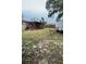 The backyard offers a covered patio and an open space with a hammock, blending outdoor relaxation at 5151 22Nd N Ave, St Petersburg, FL 33710