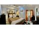 This cozy bedroom offers ample natural light, a ceiling fan and unique decor that creates a warm and inviting ambiance at 5151 22Nd N Ave, St Petersburg, FL 33710