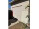 Detached garage with a light beige color, horizontal panel design and adjacent tropical plant at 5151 22Nd N Ave, St Petersburg, FL 33710