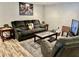 Inviting living room with a comfortable reclining sofa, contemporary decor, and a relaxing atmosphere for unwinding at 5151 22Nd N Ave, St Petersburg, FL 33710