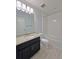 Bathroom features granite counters, tile floors, and shower-tub combo at 5509 Cumberland Star Ct, Lutz, FL 33558