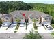A well-maintained townhome with manicured landscaping and attached garages at 5509 Cumberland Star Ct, Lutz, FL 33558