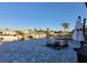 Picturesque waterfront patio with seating overlooking a private boat dock and canal at 6337 Cocoa Ln, Apollo Beach, FL 33572