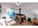 Bright and open game room featuring a foosball table and access to the outdoor pool at 6337 Cocoa Ln, Apollo Beach, FL 33572