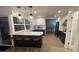 Spacious kitchen with a large island, sleek countertops, and plenty of cabinet space at 6337 Cocoa Ln, Apollo Beach, FL 33572