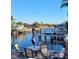 Waterfront seating area on a private boat dock, ideal for enjoying canal views at 6337 Cocoa Ln, Apollo Beach, FL 33572