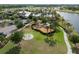 Aerial view features neighborhood playground, clubhouse and water features at 6337 Shore Vista Pl, Apollo Beach, FL 33572