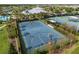 Overhead view of a well-maintained basketball court in a community recreation area at 6337 Shore Vista Pl, Apollo Beach, FL 33572