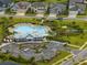 Desirable community pool with abundant seating, a stylish clubhouse, and a playground for outdoor enjoyment at 6337 Shore Vista Pl, Apollo Beach, FL 33572
