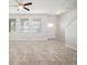 Open-concept living room area filled with lots of natural light at 6337 Shore Vista Pl, Apollo Beach, FL 33572