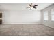Bright living area featuring tile flooring and a ceiling fan at 6337 Shore Vista Pl, Apollo Beach, FL 33572