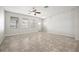 Open-concept living room area filled with lots of natural light at 6337 Shore Vista Pl, Apollo Beach, FL 33572
