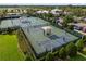 Aerial photo of community pickleball courts surrounded by lush landscaping at 6337 Shore Vista Pl, Apollo Beach, FL 33572