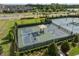 Aerial perspective of a community's pickleball courts, showcasing its recreational amenities at 6337 Shore Vista Pl, Apollo Beach, FL 33572
