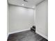A neutral room featuring dark flooring and a small staircase, perfect for storage or transition to another level at 7209 Meeting House Ln, Apollo Beach, FL 33572