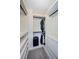 Walk-in closet with custom shelves and clothing rods, maximizing storage at 7241 56Th N Ave, St Petersburg, FL 33709
