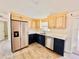 Updated kitchen featuring stainless steel appliances, custom cabinets, and a large sink at 754 Seminole Blvd, Tarpon Springs, FL 34689