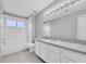 This bathroom features an updated vanity and shower with new fixtures at 7826 66Th N Way, Pinellas Park, FL 33781