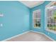 Cozy bedroom with tile flooring, natural light from large windows at 7826 66Th N Way, Pinellas Park, FL 33781