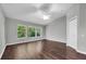 Bedroom with hardwood flooring, ceiling fan, and view at 7826 66Th N Way, Pinellas Park, FL 33781