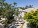 Charming two-story home with attached garage and mature trees in a well-manicured community at 7826 66Th N Way, Pinellas Park, FL 33781
