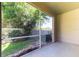 The screened patio has a nice view of the yard and the trees at 7826 66Th N Way, Pinellas Park, FL 33781