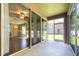 Relaxing screened patio offers seamless indoor-outdoor living with access to the lush backyard at 7826 66Th N Way, Pinellas Park, FL 33781