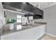 Bright kitchen featuring granite countertops and stainless-steel appliances at 8719 Lake Place Ln, Tampa, FL 33634