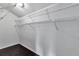 Walk-in closet with built-in wire shelving at 8719 Lake Place Ln, Tampa, FL 33634