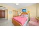 Cozy bedroom featuring a comfortable bed and beach-themed decor at 880 Mandalay Ave # C908, Clearwater Beach, FL 33767