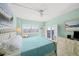 Serene main bedroom features shuttered windows, comfortable bedding, and decor accents at 880 Mandalay Ave # C908, Clearwater Beach, FL 33767