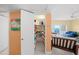 Well-organized pantry offers shelving, storage, and access to a spacious living area with a balcony at 880 Mandalay Ave # C908, Clearwater Beach, FL 33767
