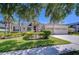 Lovely single-story home with a stone accent entryway, attached 3-car garage, and well-manicured front lawn at 9211 Everwood Ct, Tampa, FL 33647