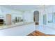 Kitchen featuring granite countertops, stainless steel appliances, and an open layout at 9211 Everwood Ct, Tampa, FL 33647