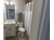 This is a clean and functional bathroom with a shower/tub, a toilet with a bidet, and a sink with storage at 9660 Sweetwell Pl, Riverview, FL 33569