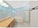 Beautiful bathroom features a soaking tub, glass-enclosed shower, and modern fixtures at 2452 Big Pine Dr, Holiday, FL 34691