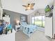 Bright bedroom with ceiling fan, lots of natural light, and charming decor at 2452 Big Pine Dr, Holiday, FL 34691