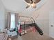 Fun room with bunk bed, slide and soft carpet at 2452 Big Pine Dr, Holiday, FL 34691