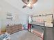 Bright bedroom with bunk beds, ceiling fan, and plush decor, perfect for  at 2452 Big Pine Dr, Holiday, FL 34691