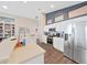 Bright kitchen with white countertops and cabinets, stainless steel appliances, and plenty of natural light at 2452 Big Pine Dr, Holiday, FL 34691