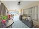 Inviting covered lanai with stylish furniture and decor, perfect for outdoor dining and relaxing at 2452 Big Pine Dr, Holiday, FL 34691
