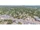 An aerial view of the neighborhood with green trees and downtown city view at 1025 W Berry Ave, Tampa, FL 33603