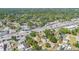 An aerial view of the neighborhood with lake, businesses, and highway at 1025 W Berry Ave, Tampa, FL 33603