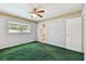 The home features a bedroom with a window for natural light at 10314 Lake Carroll Way, Tampa, FL 33618