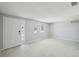 Bright living room featuring a neutral color scheme, plenty of natural light, and ample space at 1153 Honor Dr, Holiday, FL 34690
