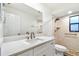 Modern bathroom features a new shower and vanity at 1236 Abbey Crescent Ln, Clearwater, FL 33759