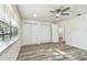 Bedroom featuring new floors, natural light, and closet at 1236 Abbey Crescent Ln, Clearwater, FL 33759