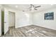 Clean bedroom with new floors and neutral walls at 1236 Abbey Crescent Ln, Clearwater, FL 33759