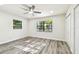 Bright bedroom with lots of natural light and new floors at 1236 Abbey Crescent Ln, Clearwater, FL 33759